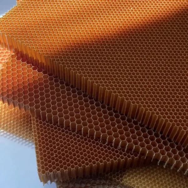 Aramid honeycomb core is an advanced structural material offering exceptional strength-to-weight ratio and impactresistance. Made from meta-aramid fiber paper and phenolic resin, this hexagonal core structure delivers outstandingmechanical performance while remaining extremely lightweight.