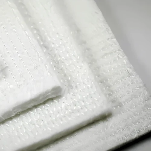 Stitch-bonded fiberglass needle mat is a high-performance thermal insulation material designed forextremetemperature environments. Manufactured by mechanically interlocking glass fibers through a needingandstitching process, this mat offers exceptional durability, flexibility, and resistance to high temperatures. it is widely usedin industrial insulation, automotive thermal management, and fire protection applications.